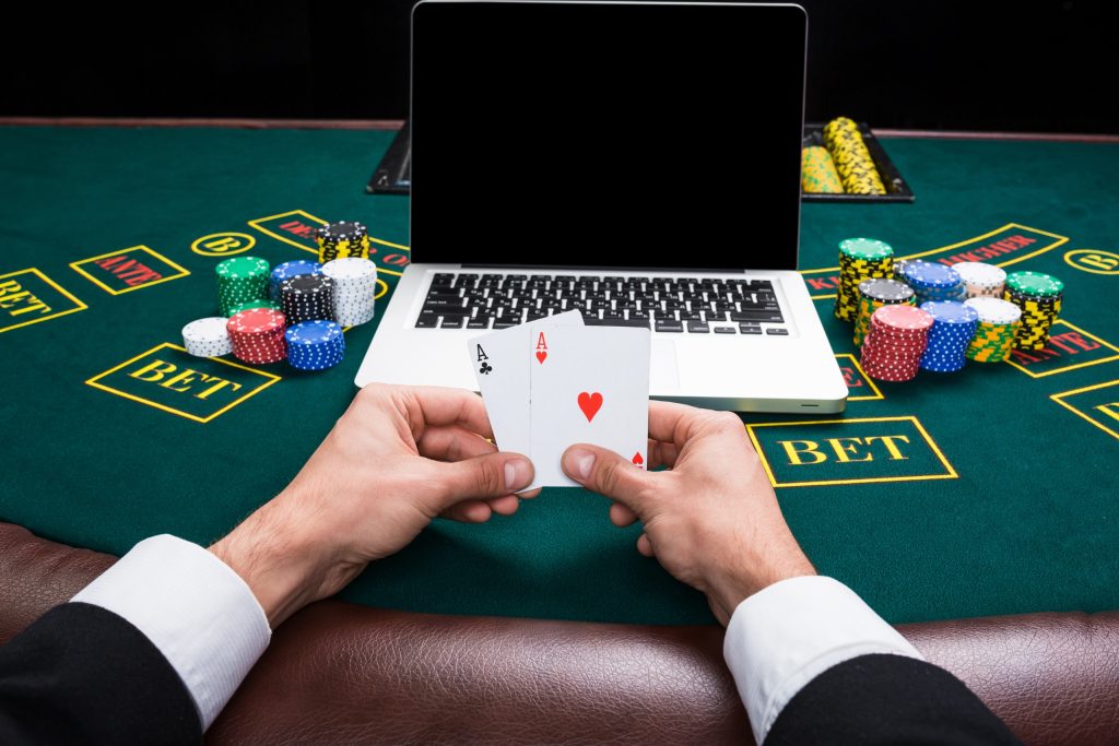 casino, online gambling, technology and people concept